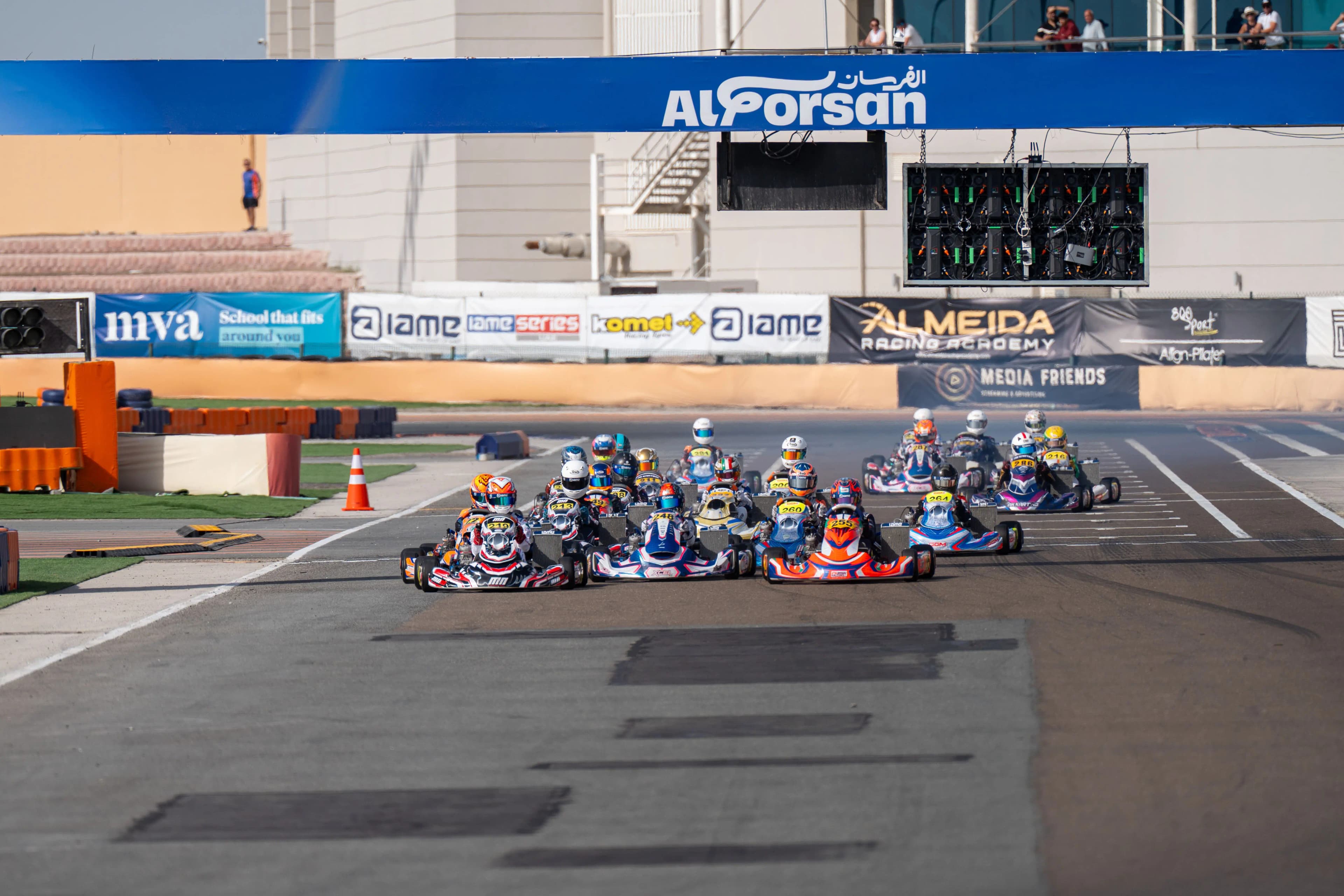 The field lined up on the grid at Al Forsan before the start