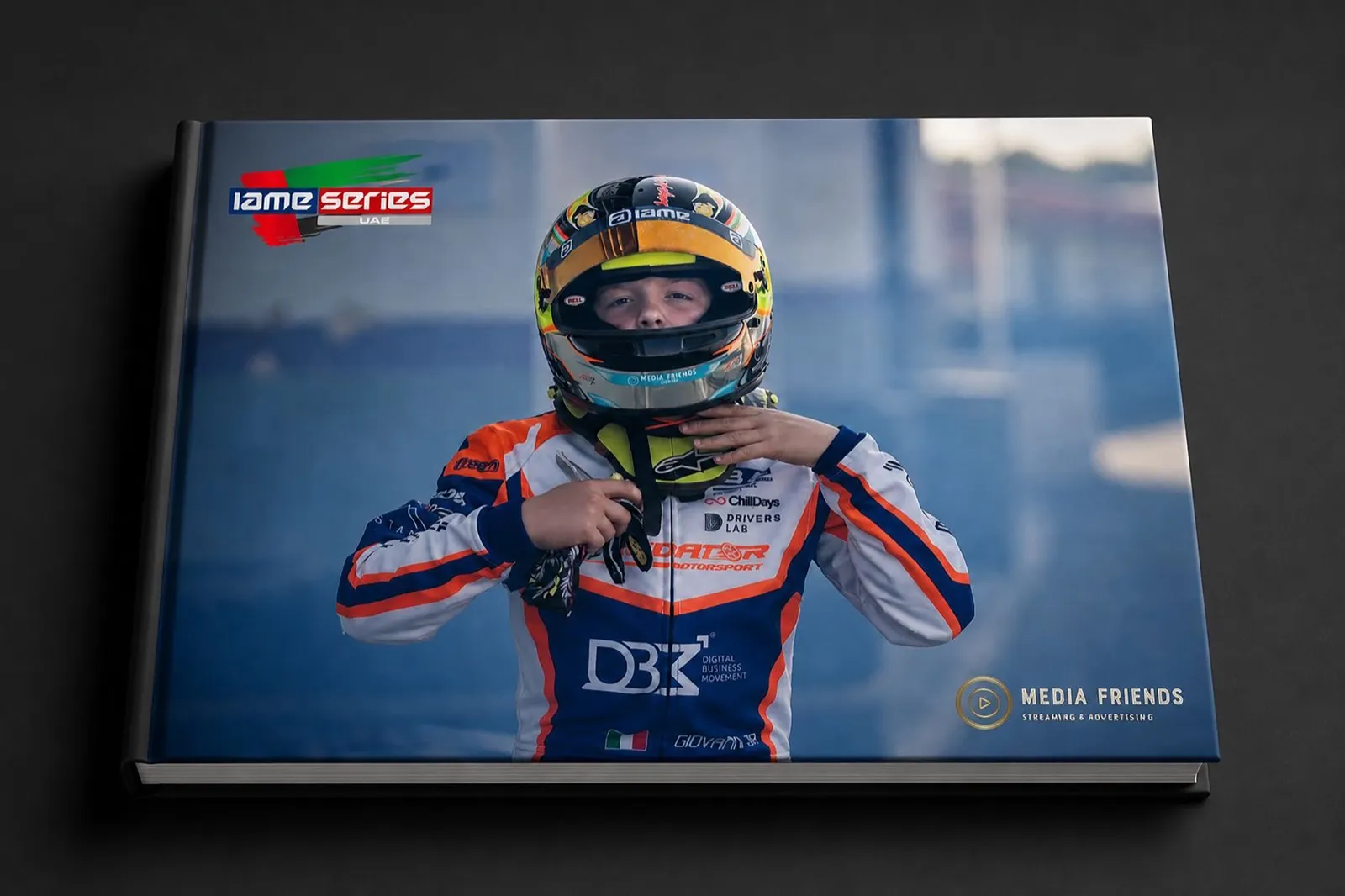 A4 hardcover photo album with a karting driver fastening a helmet on the matte cover